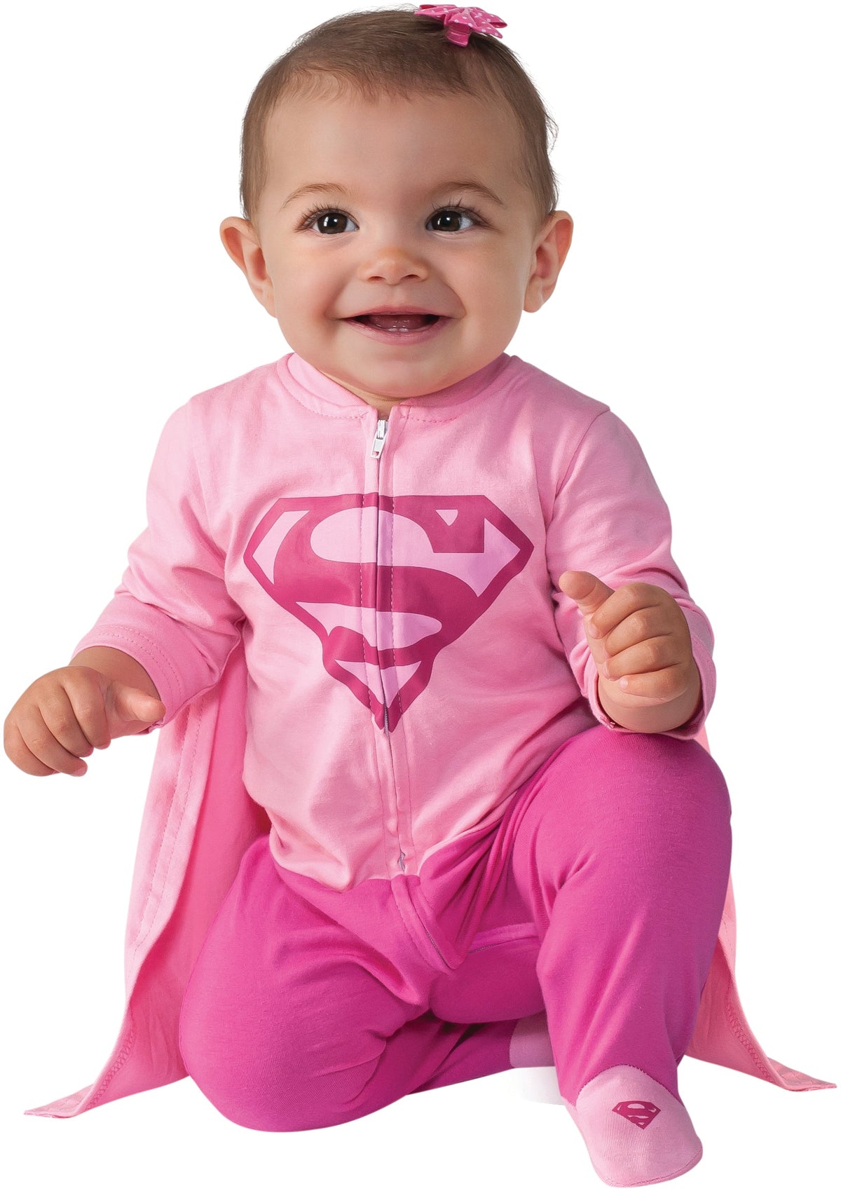 Pink Supergirl romper with front zipper, shield logo, and attached cape