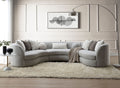 Light gray boucle sectional sofa with tufted back cushions and matching throw pillows