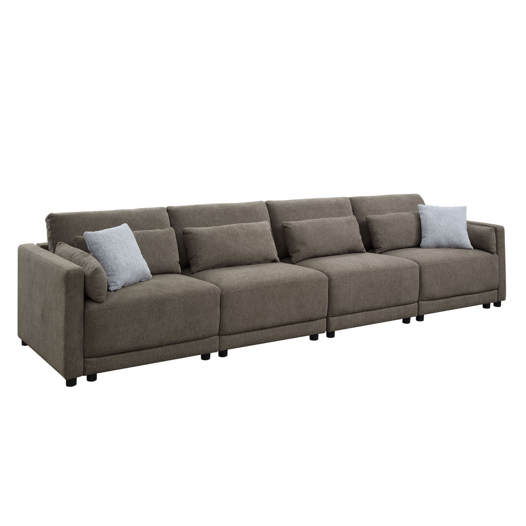Dark brown modular sectional sofa with chaise-style seating and gray toss pillows