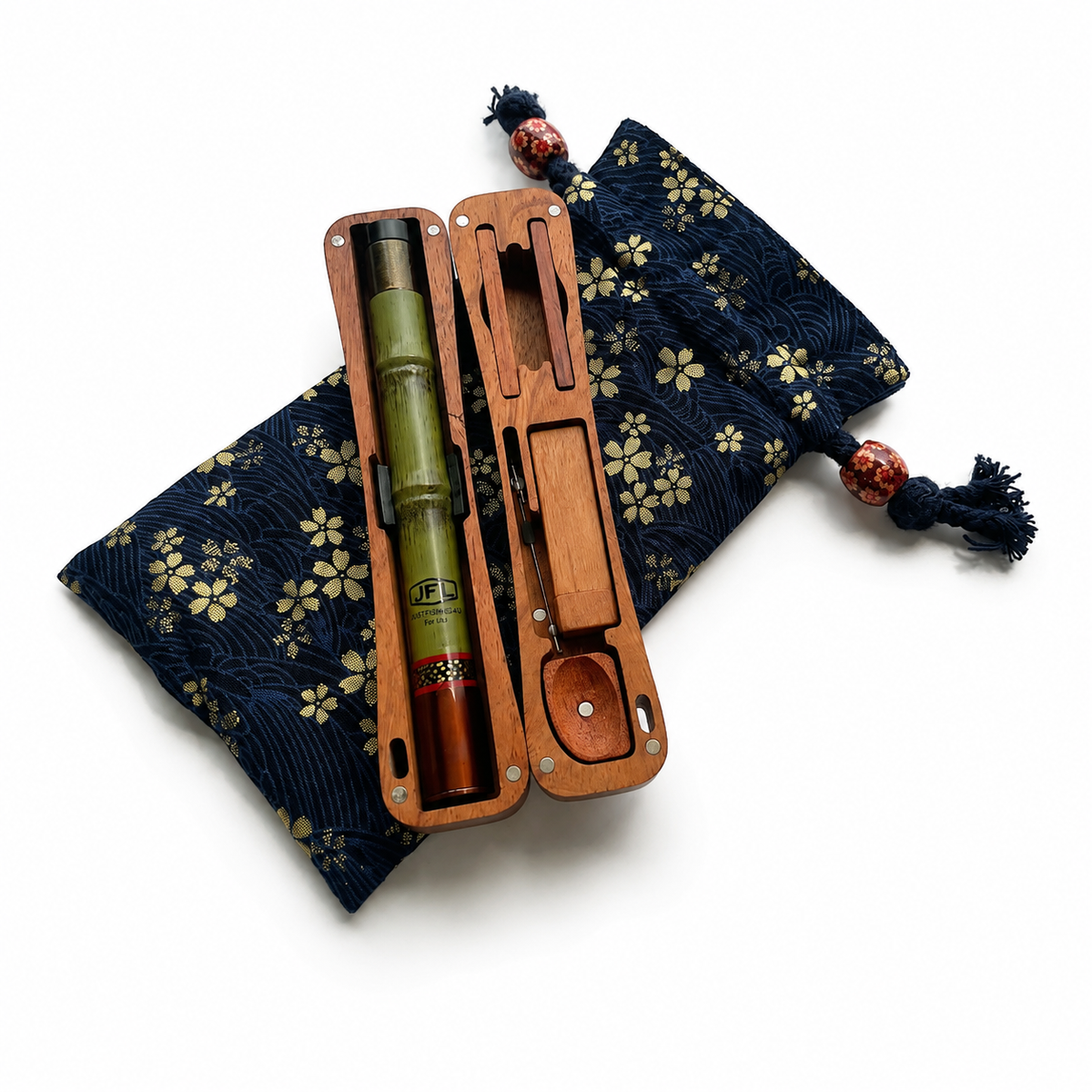 Pocket travel fishing kit with dark blue patterned pouch, tan wooden case, and green rods