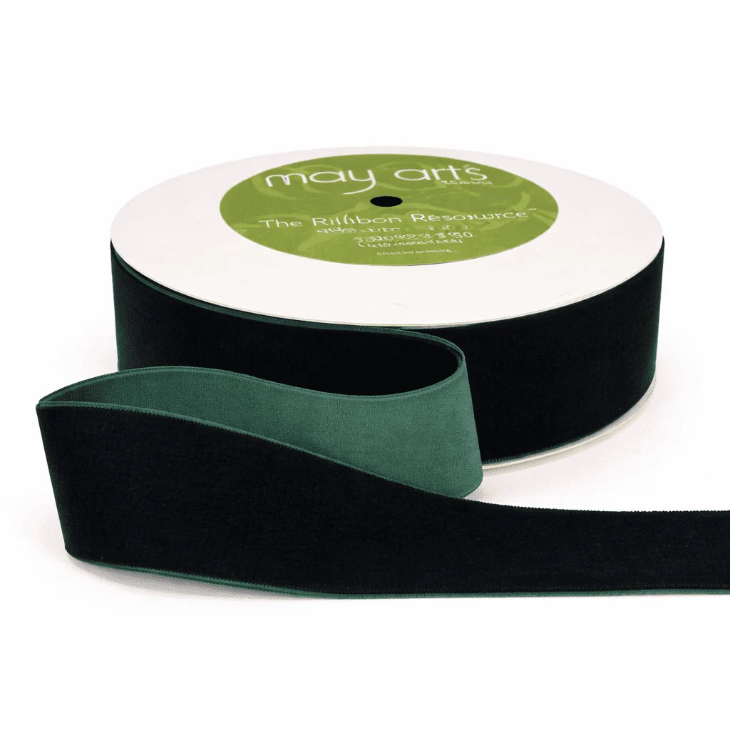 Green velvet ribbon roll, 1.5-inch wide, unspooled ribbon in a loop