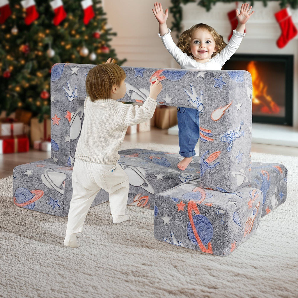 Kids modular couch sectional with grey space prints and child playing in doorway