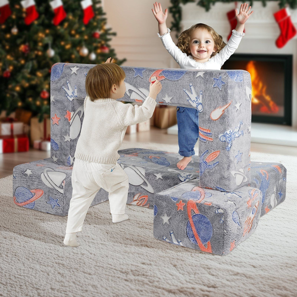 Kids modular couch sectional with grey space prints and child playing in doorway