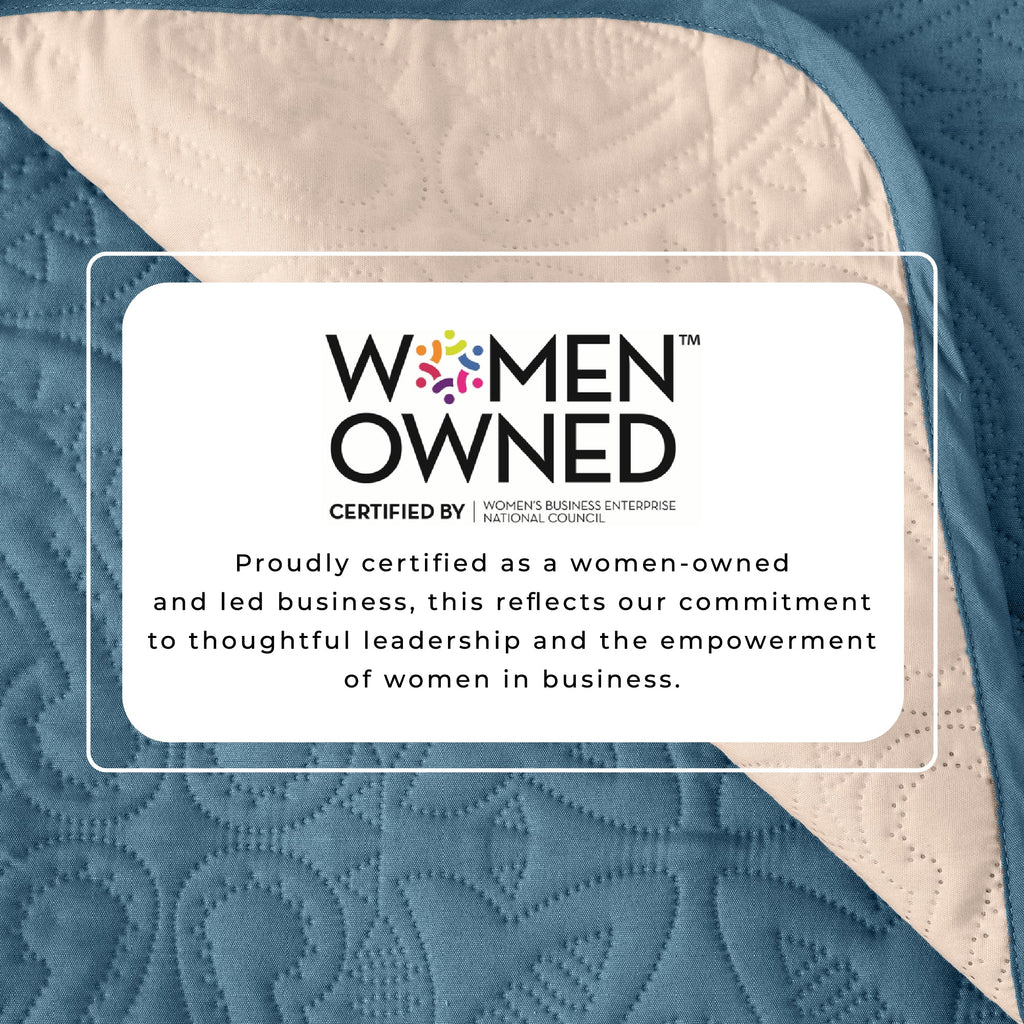 Blue quilted chair protector with Women Owned certification badge