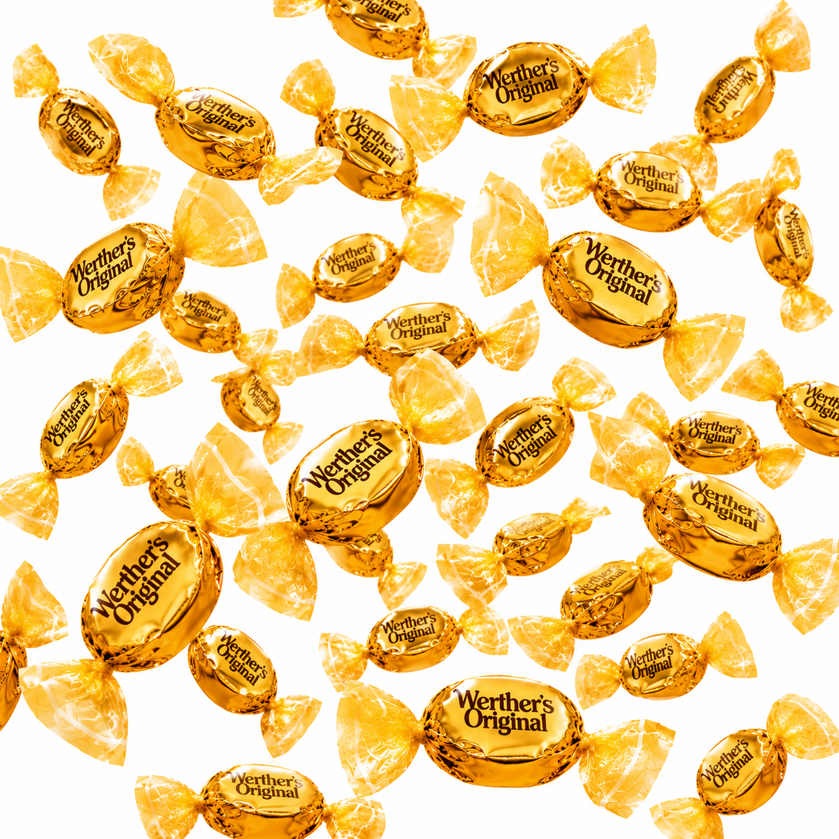 Assorted wrapped caramel hard candies scattered across the surface