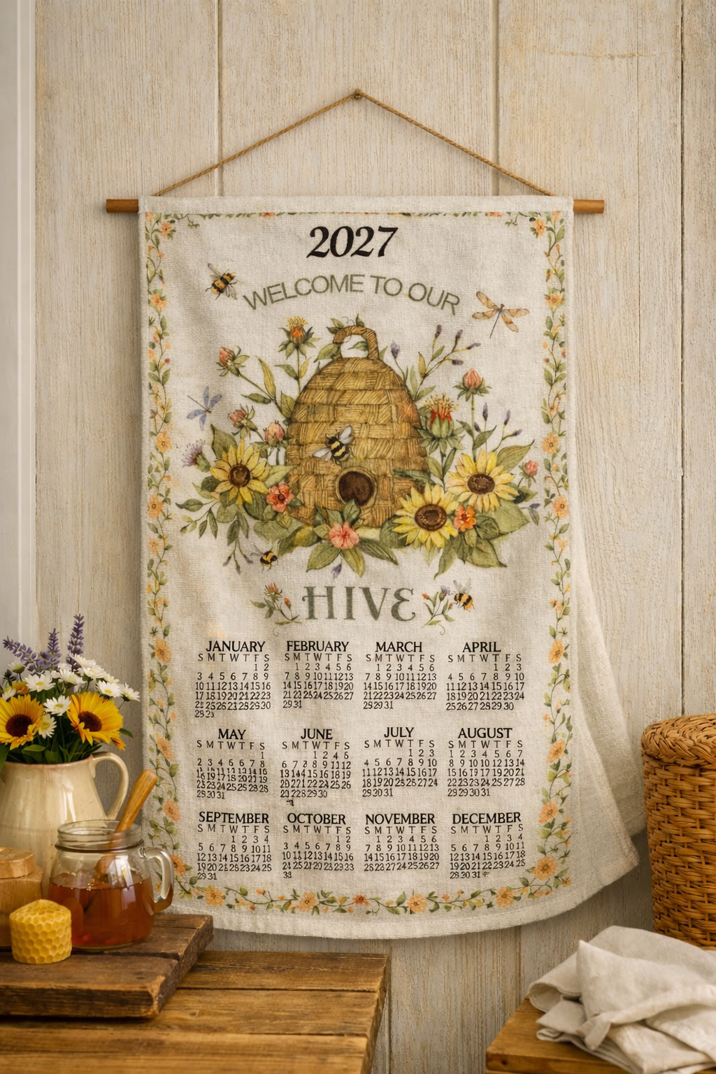 Hanging linen 2027 calendar towel with bee, hive, and floral border