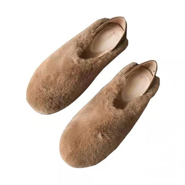 Brown faux-fur round-toe slip-on loafers, pair with tan footbed on white background