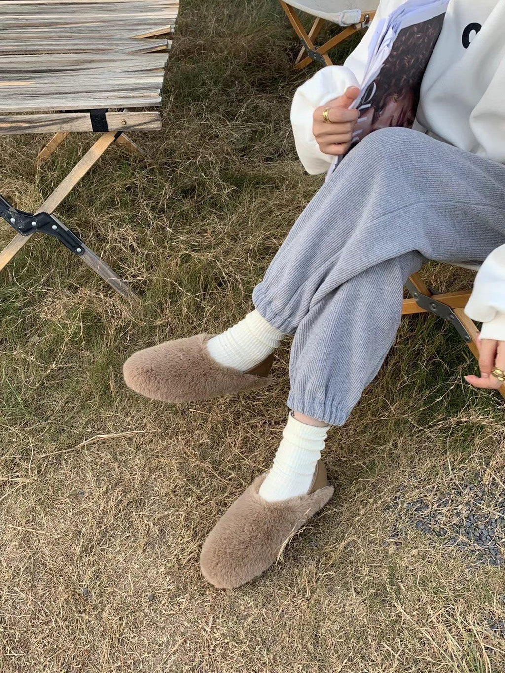 Brown fuzzy round-toe slip-on slippers with plush lining for indoor or outdoor wear
