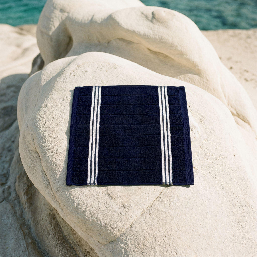 Cotton washcloth, navy with white striped border