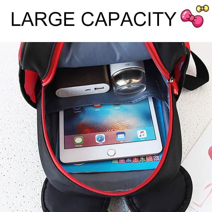 Mini mouse backpack open view with zip compartment holding a tablet and phone