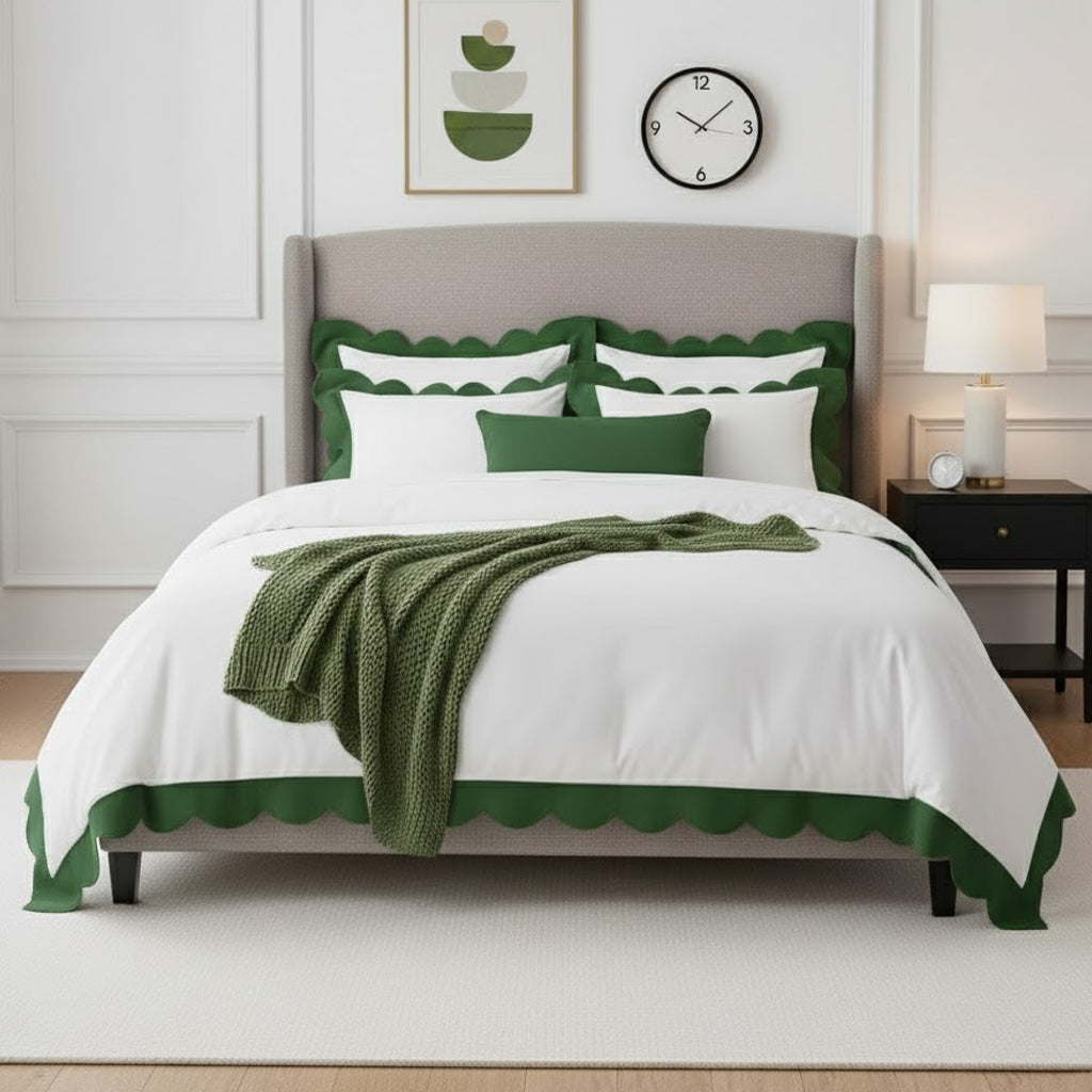 White cotton duvet cover with green wavy applique scalloped border and matching shams