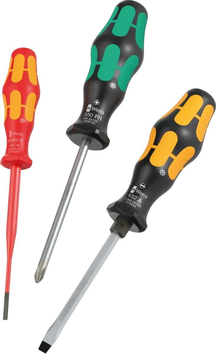 Three Wera screwdrivers with red, green and yellow handles and metal shafts