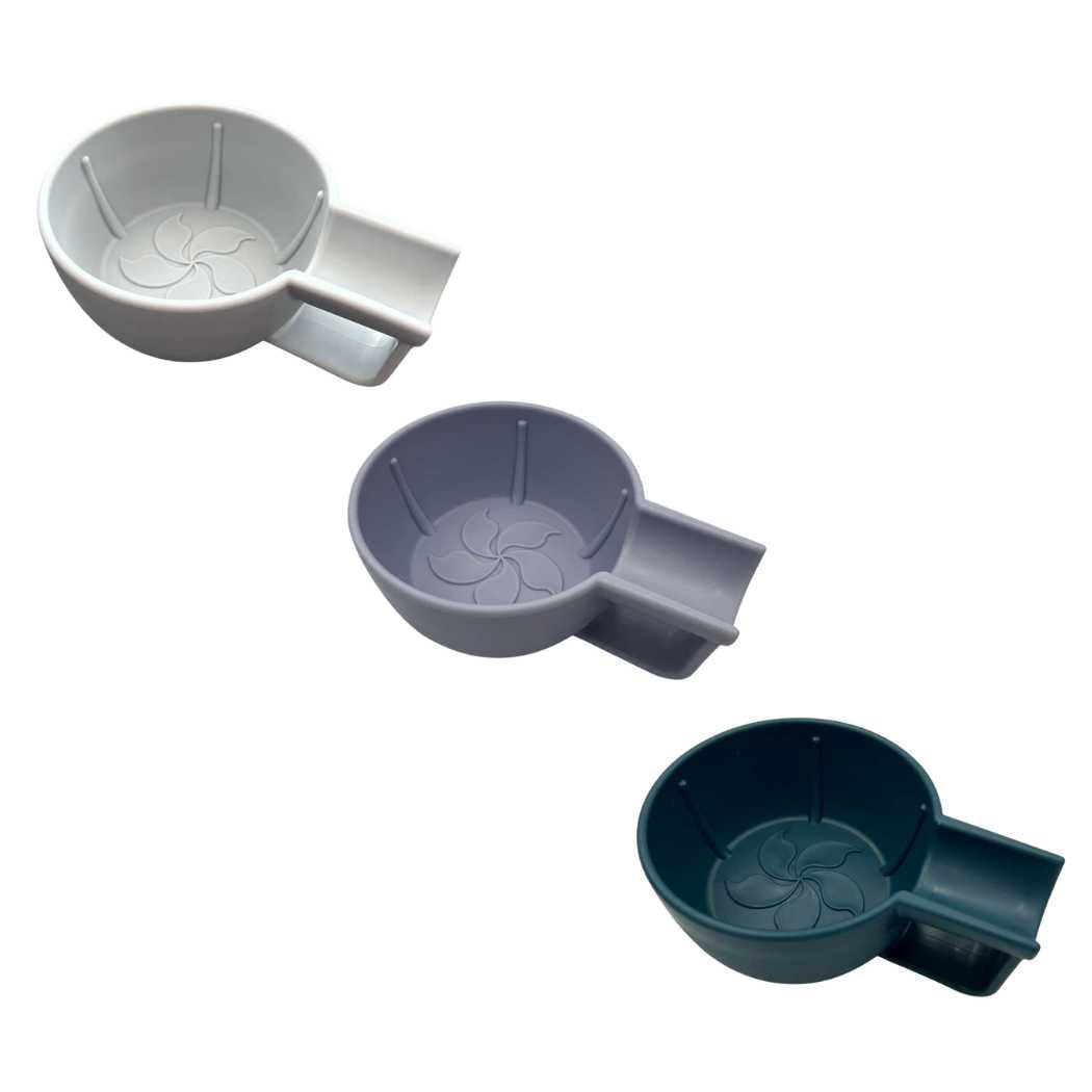 Plastic cartridge holders with hinged compartments in gray and dark teal