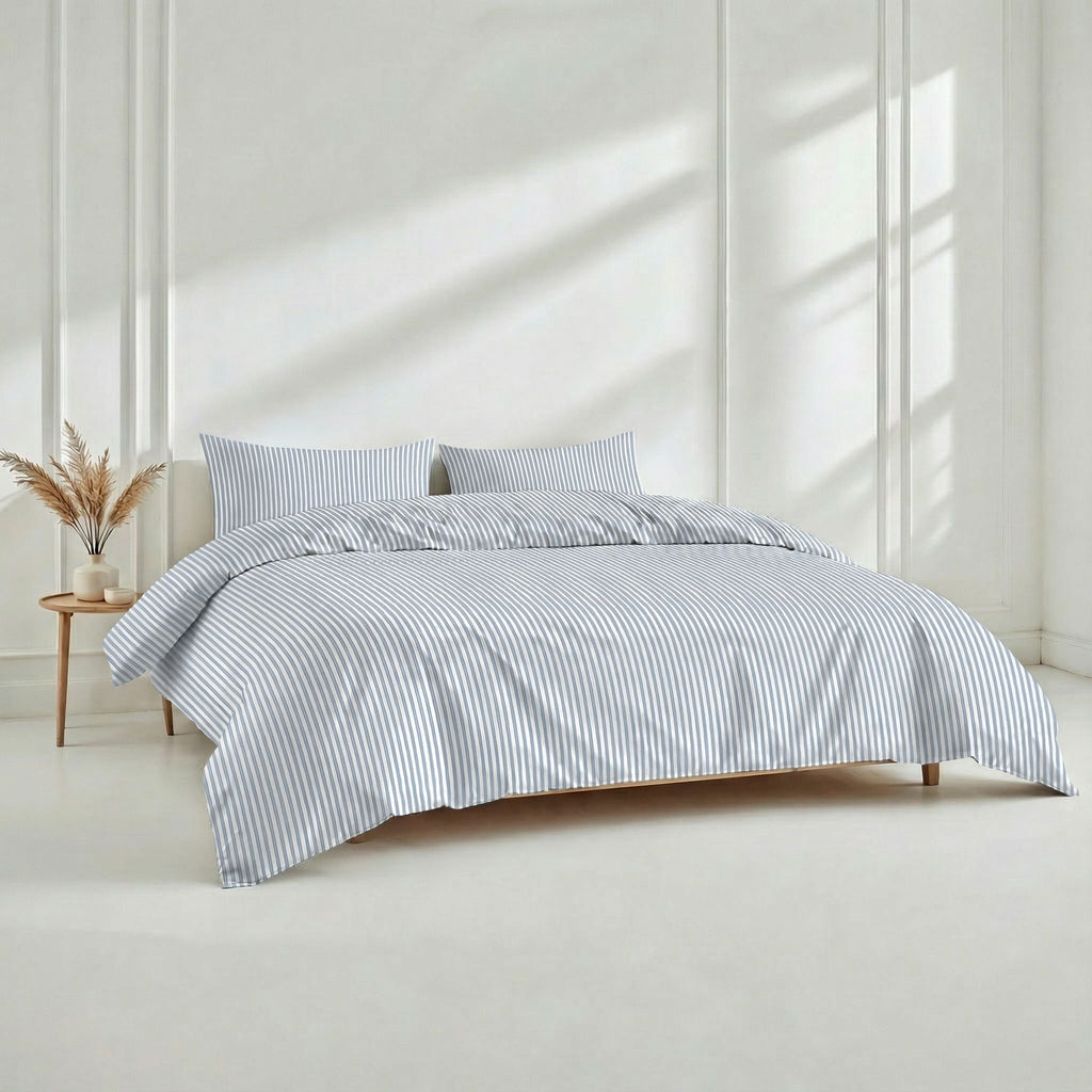 Light blue and white striped duvet cover with matching pillow shams