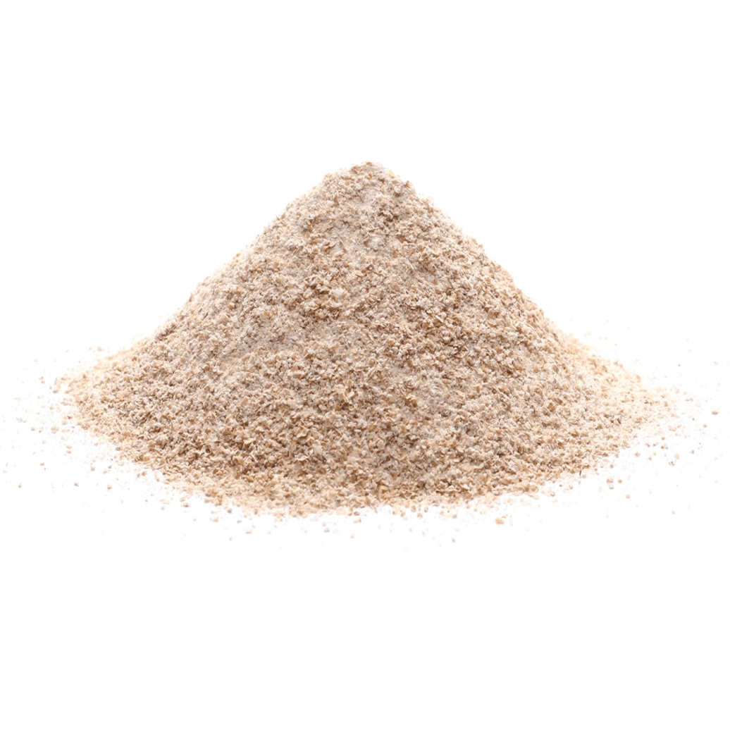 Pile of whole wheat flour, light tan powder mound.