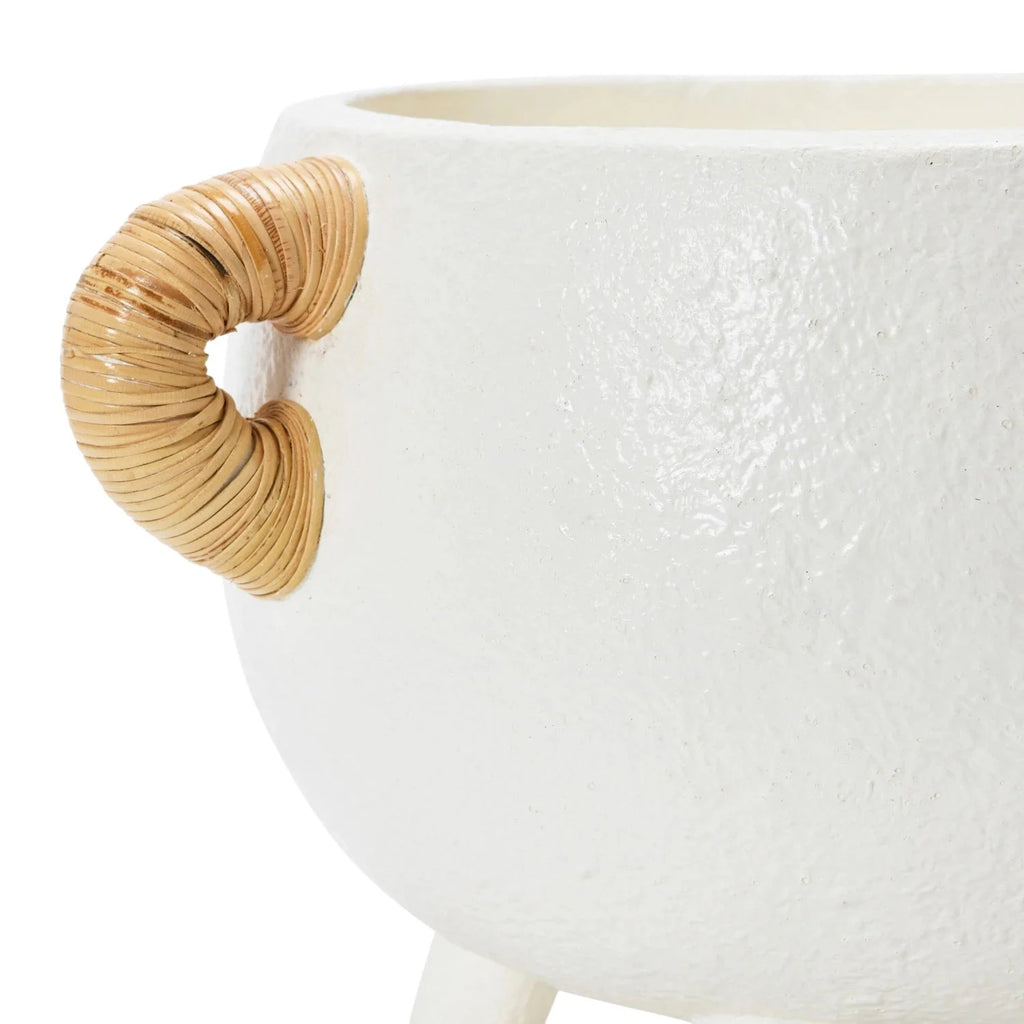 Close-up of white planter side with rattan loop handle