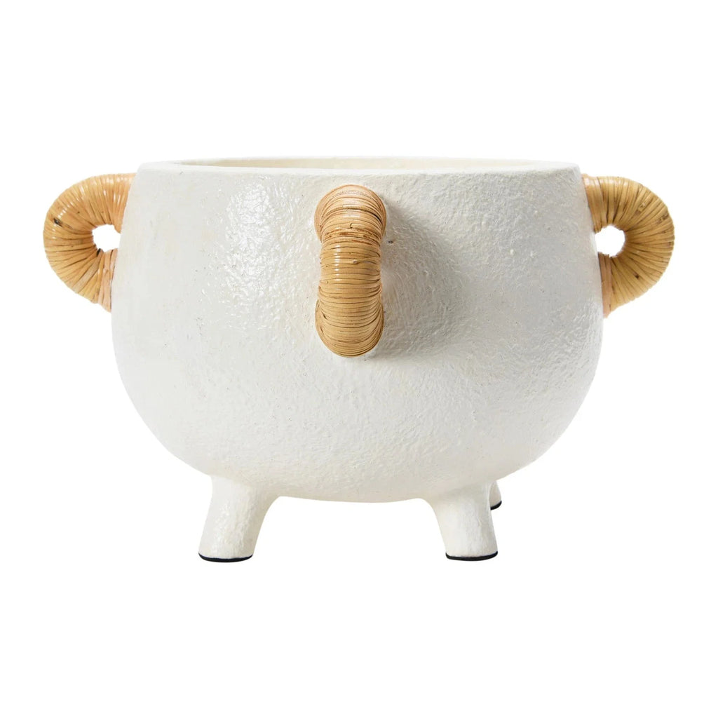 White ceramic planter with rattan loop handles and three legs