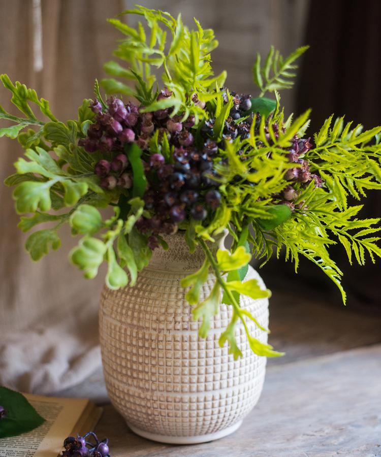 Textured ceramic jar vase with speckled rim and textured grid pattern