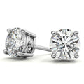Round lab-grown diamond stud earrings with four-prong settings in white gold