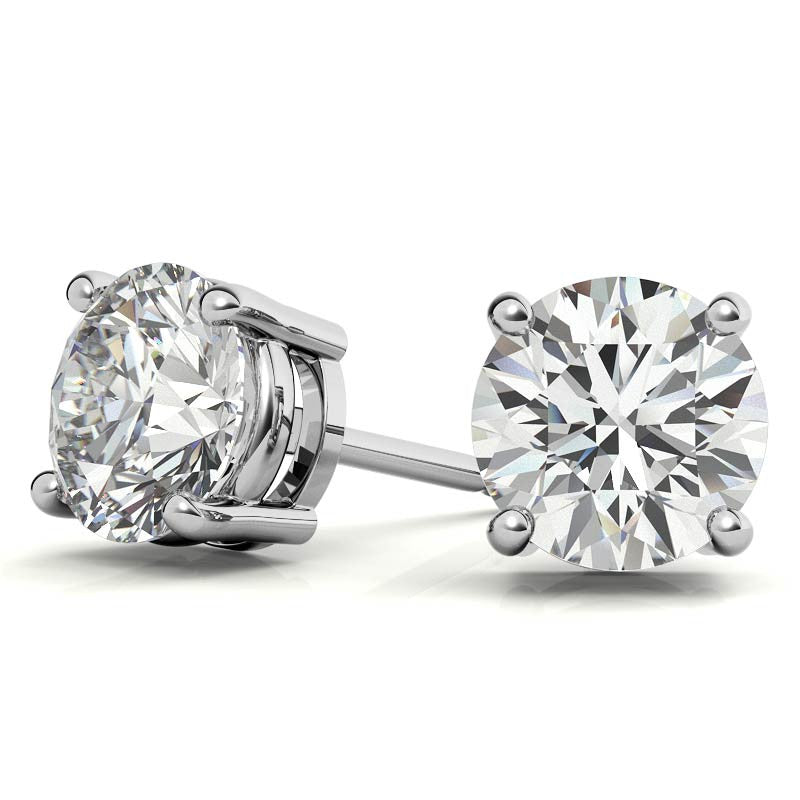 Round lab-grown diamond stud earrings with four-prong settings in white gold