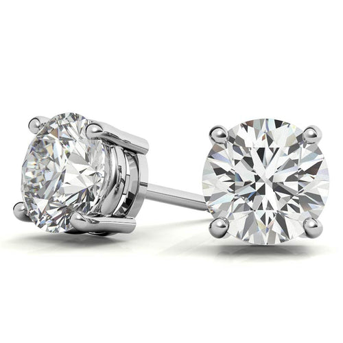 Round lab-grown diamond stud earrings with four-prong settings in white gold