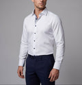 White button-up dress shirt with blue check contrast collar and placket, dark buttons