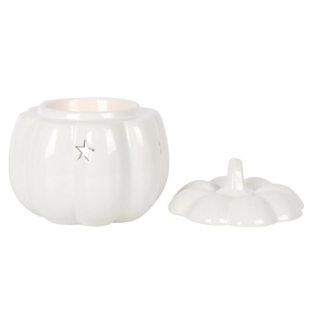 White ceramic pumpkin oil burner with star detail and matching lid pieces