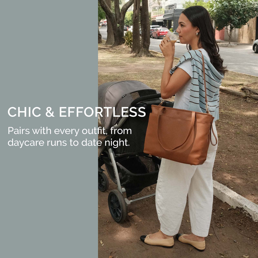 Chestnut tote bag with two top handles, carried alongside a stroller