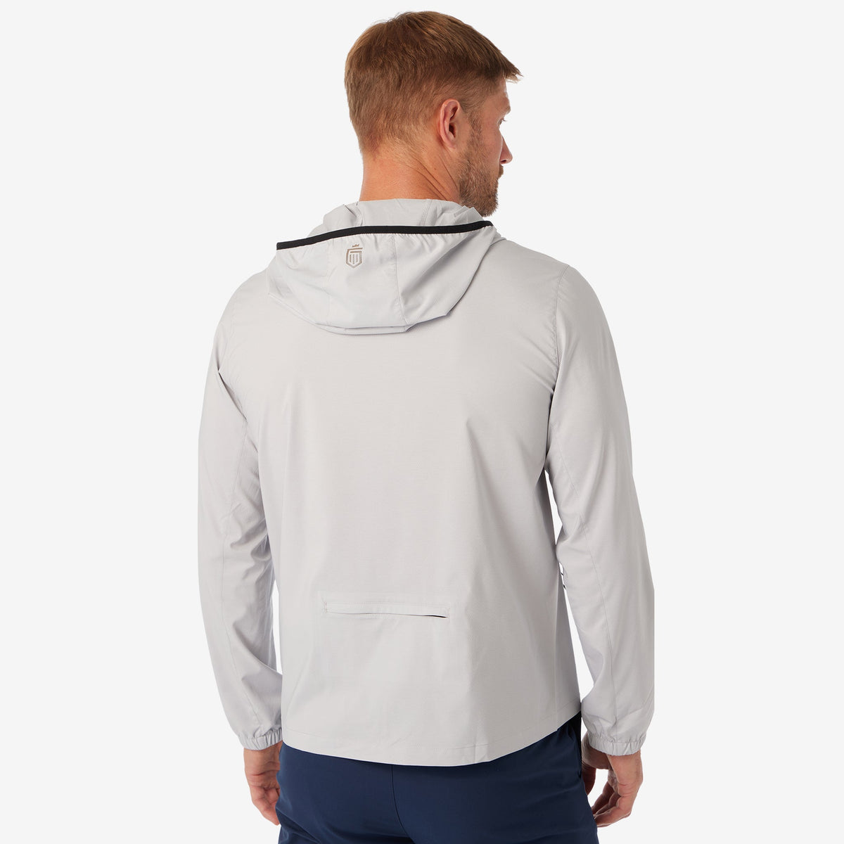Ash gray windbreaker jacket back view with hood and black trim
