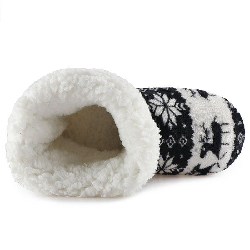 Women's faux-fur slipper boot with white sherpa lining and black snowflake outer