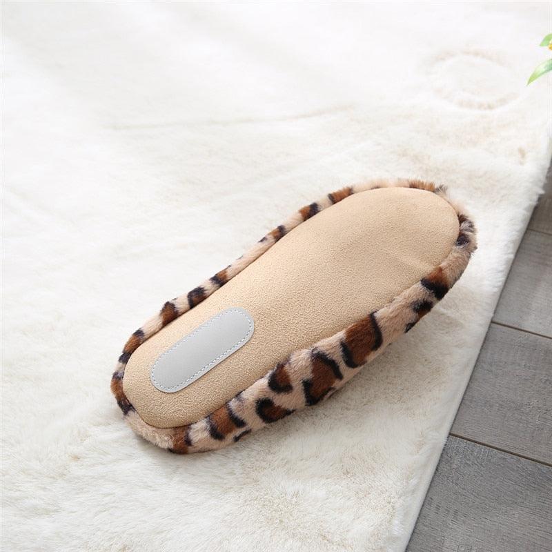 Tan slip-on slippers with brown leopard plush upper and cream insole