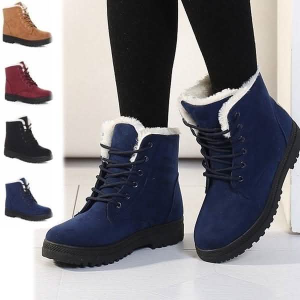 Winter short flat boots in dark blue suede with lace-up front and white sherpa lining