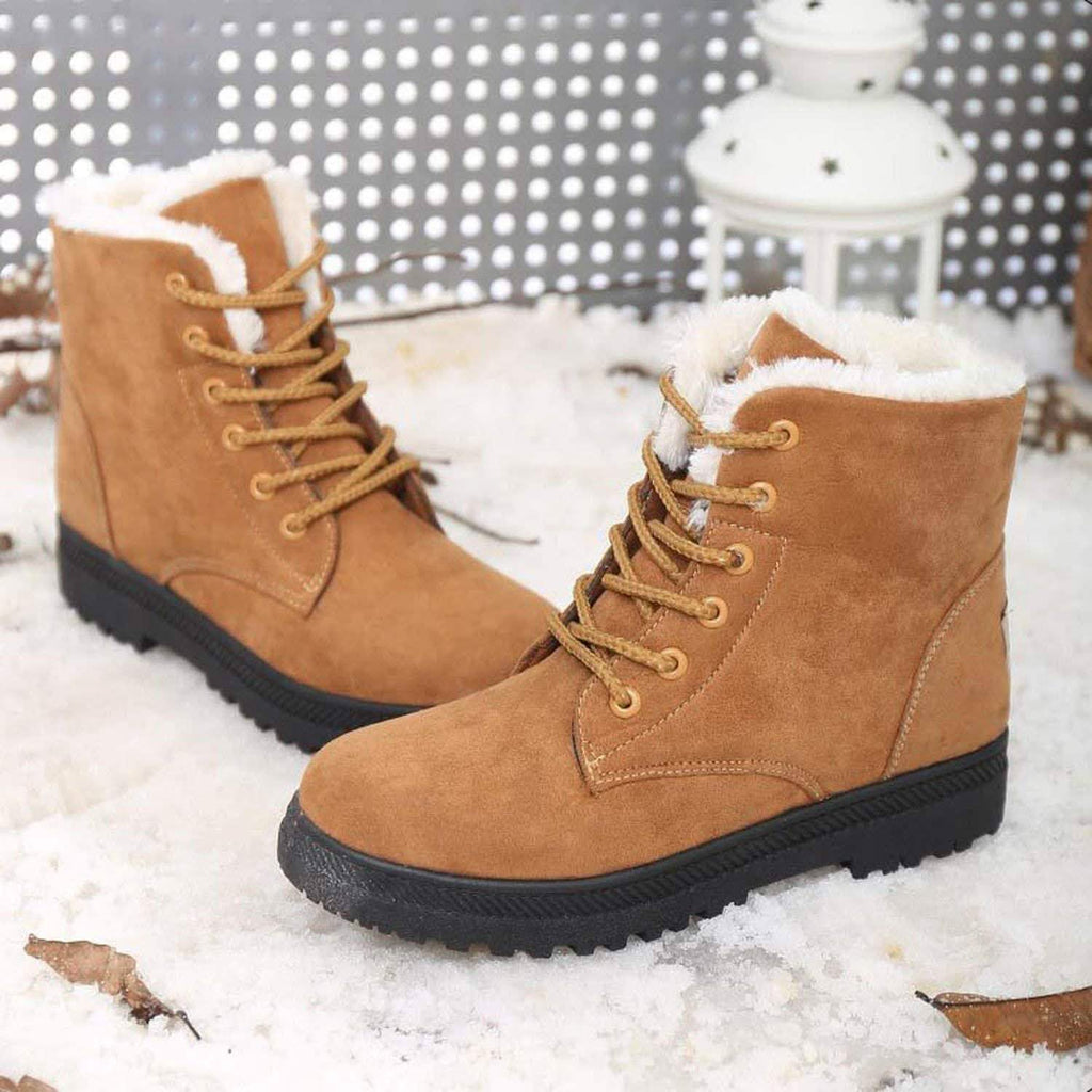 Tan-brown winter short boots with lace-up closure, faux-fur trim, and thick sole
