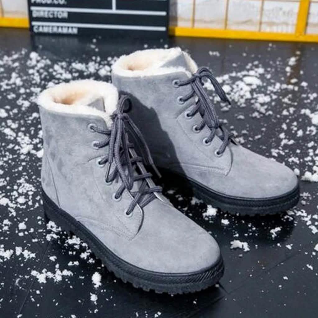 Winter short flat boots in light gray suede with gray laces and sherpa lining cuffs