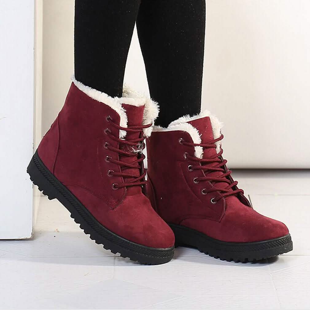Winter short flat boots in deep red suede with lace-up front and fuzzy sherpa lining