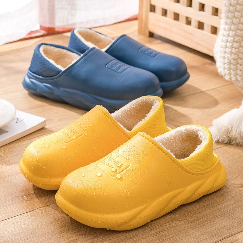 Blue and yellow plush-lined slip-on home slippers with cushioned soles