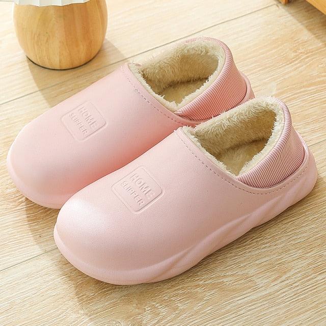 Pink slip-on slippers with plush lining and cushioned sole