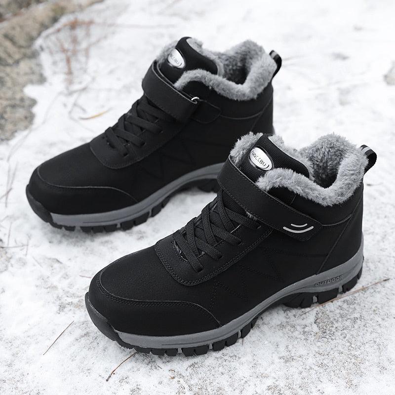 Black plush-lined lace-up winter ankle boots with grippy tread and padded collar
