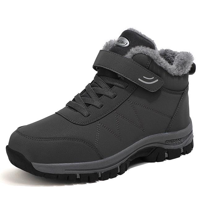 Black lace-up winter ankle boot with padded collar and grippy rubber sole