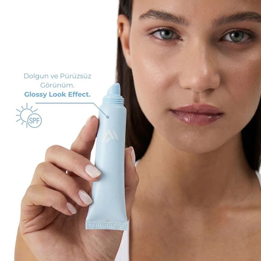 Hydrating lip balm SPF 15 clear-blue squeeze tube with pointed nozzle tip.