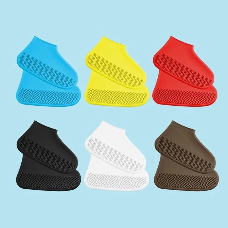Assorted silicone waterproof shoe covers in blue, yellow, red, black, white, and brown