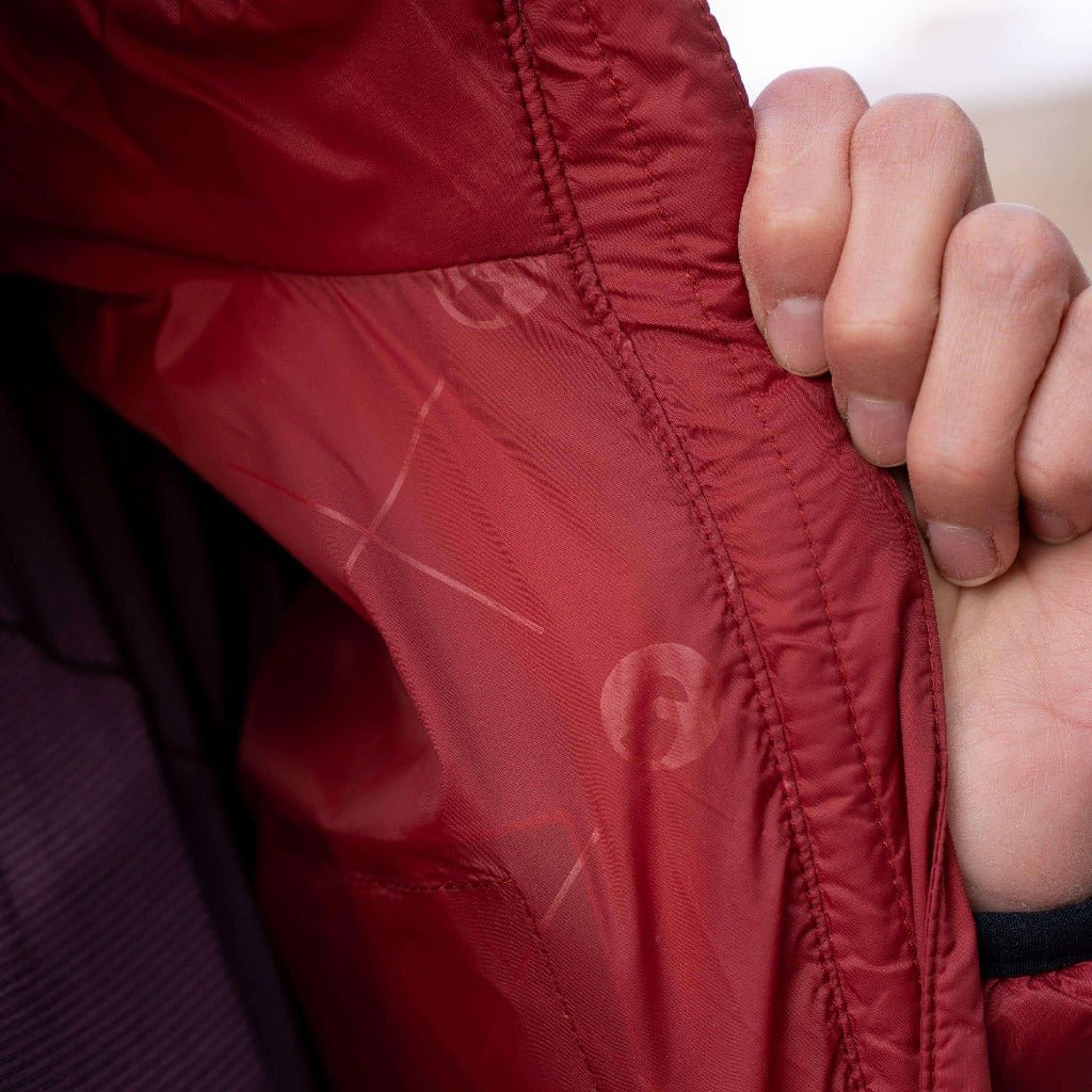Heated puffer jacket close-up of insulated fabric with stitched zipper seam