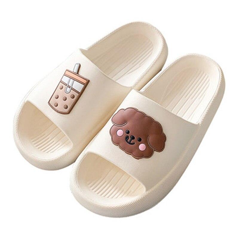 Women’s open-toe slide slippers in cream with paw print and drink icon patches