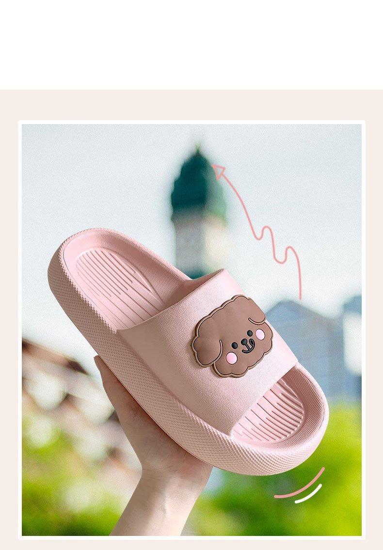 Women’s pink open-toe slide slippers with soft cushion sole and bear graphic