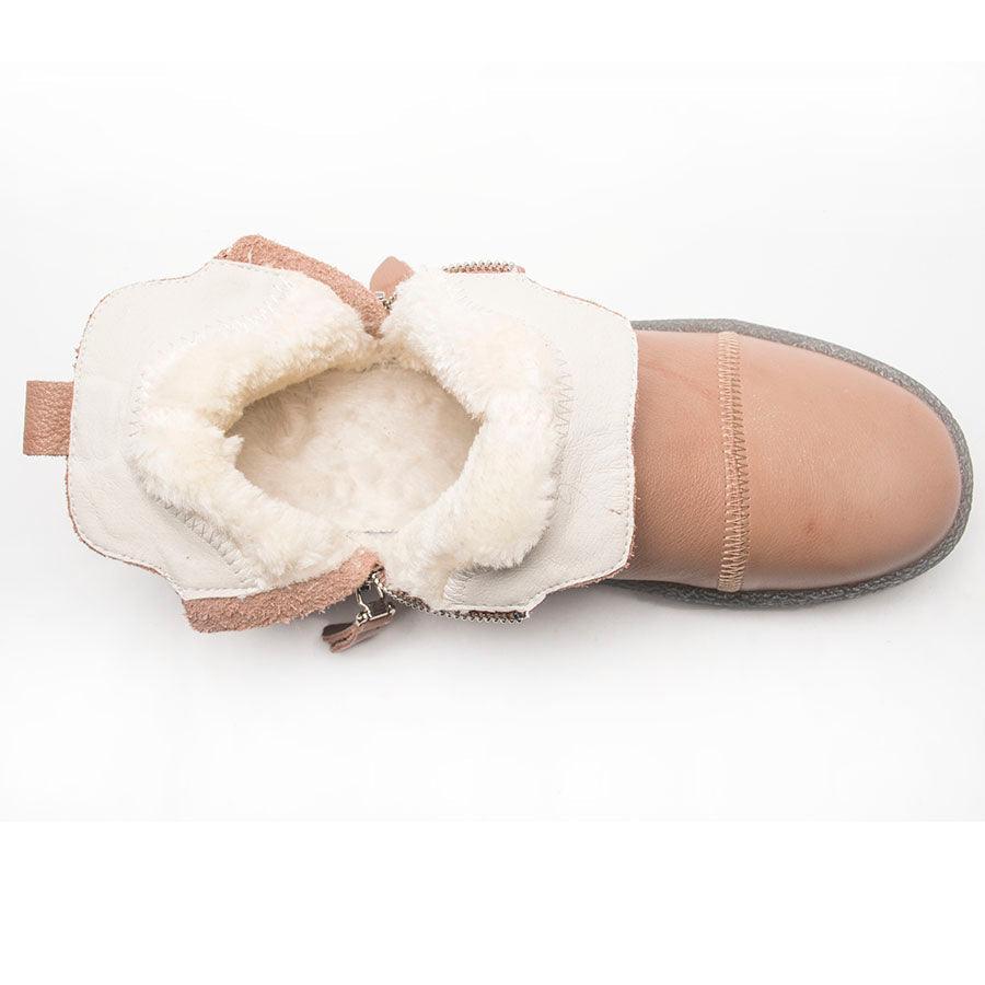 Pair of beige ankle boots with open fur collar, side zipper, and cushioned sole