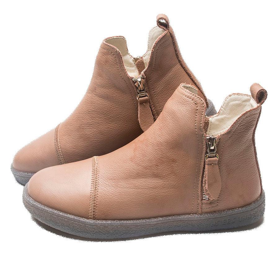 Tan genuine leather ankle boots with side zippers and fur-lined interior, low sole