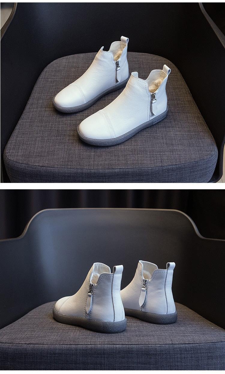 White ankle boots with side zipper and warm fur lining
