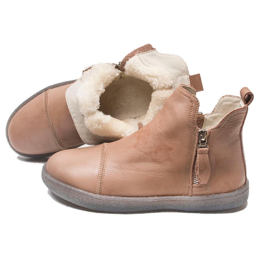 Beige slip-on ankle boots with side zipper and plush fur lining