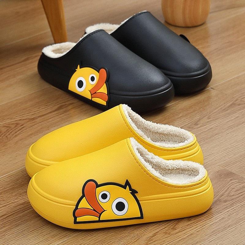 Colorful cartoon slip-on slides with thick sole, black and yellow with fuzzy lining.