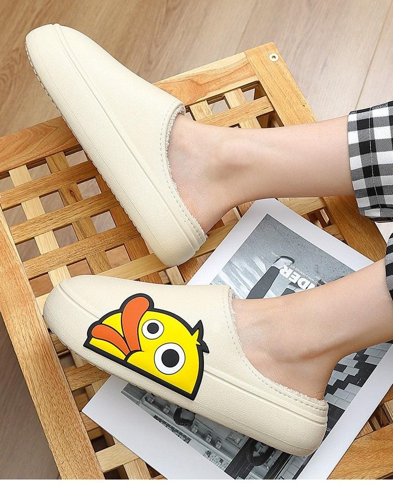 White slip-on slippers with cartoon character patch and soft plush lining